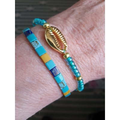 turquoiseblauw met goud armbanden setje turquoiseblauw met goud armbanden setje