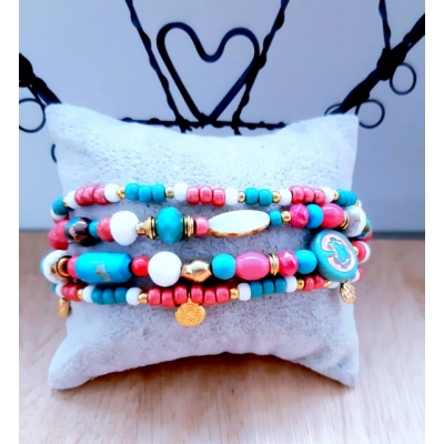 kralenarmband in roze/ turquoise/ wit en goud kralenarmband in roze/ turquoise/ wit en goud