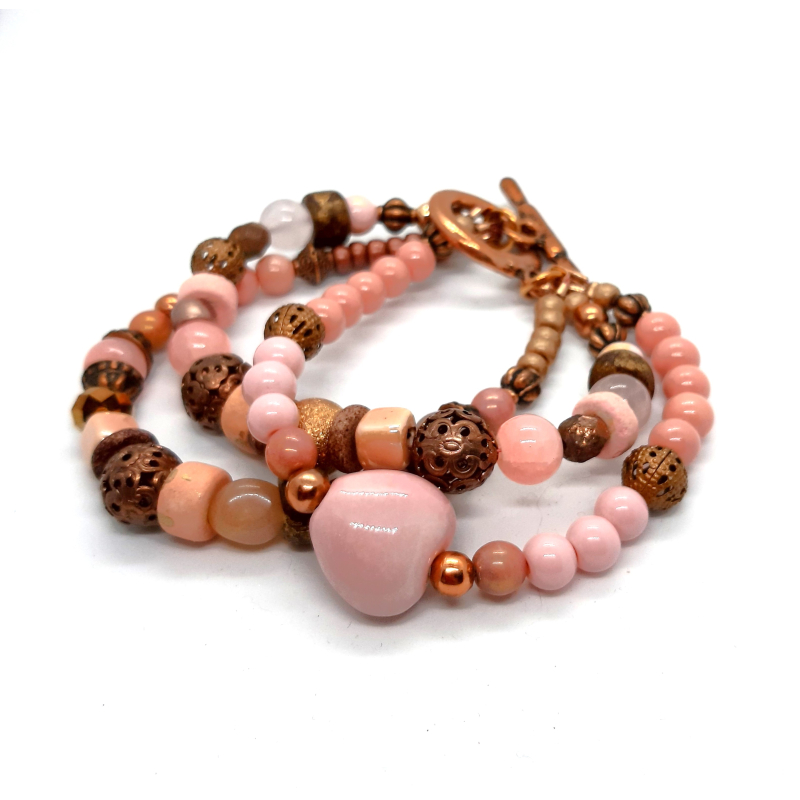 armband in verschillende roze tinten , brons en roségoud