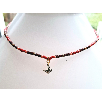 kettinkje in warm rood met gouden vlinder