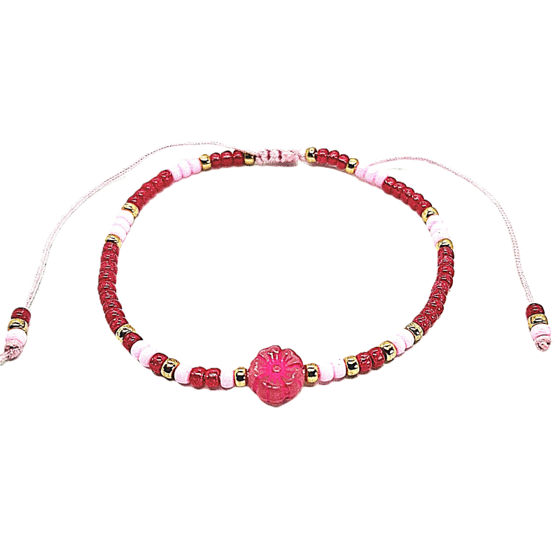 roze fuchsia schuifarmbandje met bloem