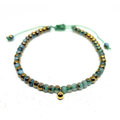 blauw met goud scharmbandje