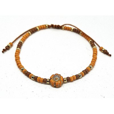 oranje bruin schuifarmbandje met bloem