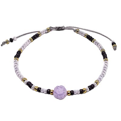 lila paars  schuifarmbandje met bloem