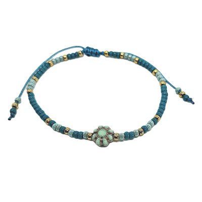 petrol blauw schuifarmbandje met bloem